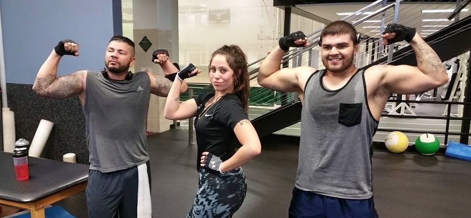 aaron ledesma with clients - wichita personal training group classes