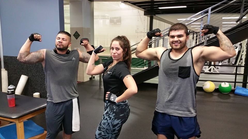 aaron ledesma with clients - wichita personal training group classes